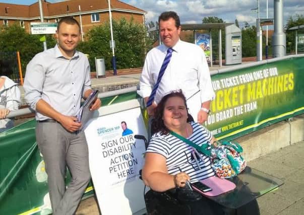 Emma Donaldson, campaigning with Conservative councillor Ben Bradley (left) and MP Mark Spencer at Kirkby train station