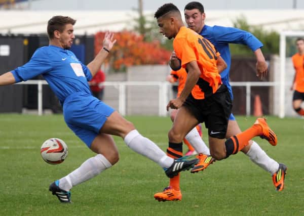 Worksop Town v Nostell Miners Welfare. Tigers player Andre Johnson in action.
