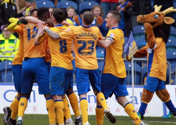 Mansfield Town v Portsmouth on Saturday March 19th 2016. Stags player Matt Green scores. Photo: Chris Etchells