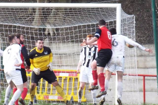 THWARTED -- Paul Staniforth tries to force the ball home at the back post for Teversal.