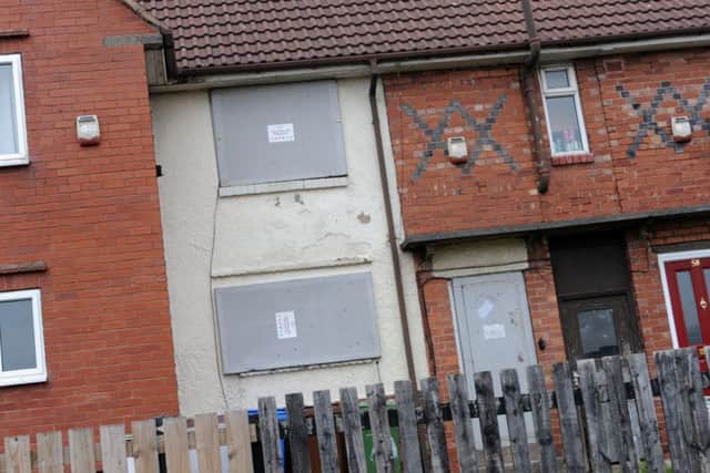 Boarded up property on Ruskin Road, Bull Farm estate, Mansfield.