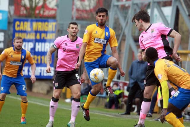 Mansfield Town v Northampton Town, Monday March 28th 2016. Mansfield player Mal Benning in action. Photo: Chris Etchells