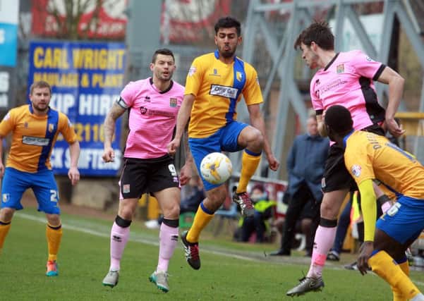 Mansfield Town v Northampton Town, Monday March 28th 2016. Mansfield player Mal Benning in action. Photo: Chris Etchells
