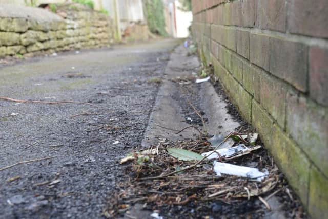 The footpath was strewn with used needles and packaging