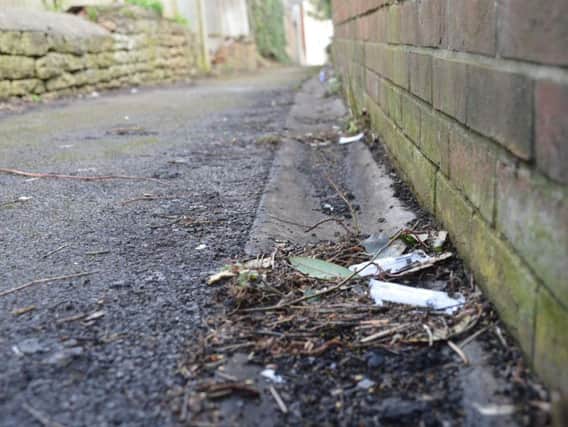 The footpath was strewn with used needles and packaging