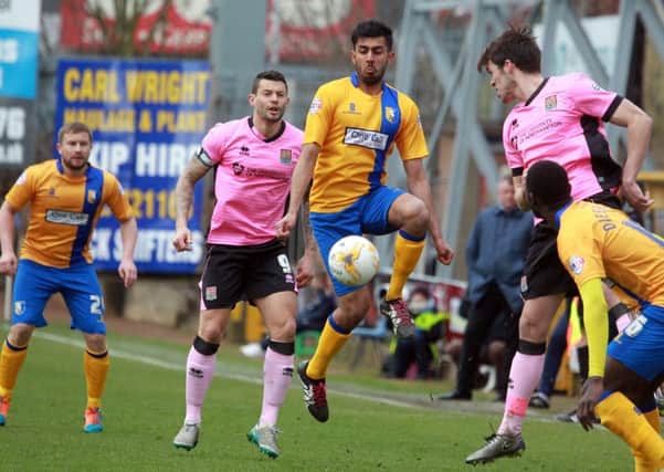 Mansfield Town v Northampton Town, Monday March 28th 2016. Mansfield player Mal Benning in action. Photo: Chris Etchells