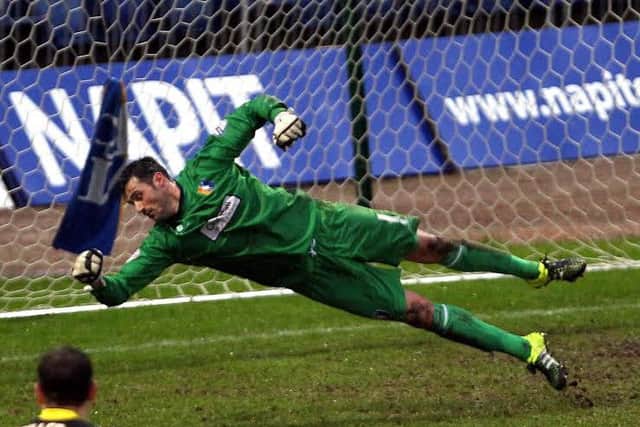 Mansfield Town v Morecambe
English League Football - Sky BET League Two
One Call Stadium, Mansfield, England.
6th February 2016
Mansfield Town goalkeeper Scott Shearer makes another save
Picture by Dan Westwell
dan.westwell@btinternet.com
07793 733140