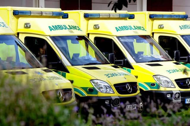 Ambulance service fined millions for missed targets as it struggles with a debt crisis.