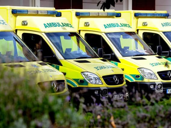 Ambulance service fined millions for missed targets as it struggles with a debt crisis.