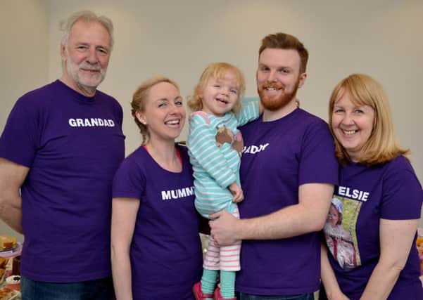Charity fundraiser at Body Box, Mansfield for two-year-old Elsie Novell. Pictured from left are Graham Green, Charlotte Novell, Elsie Novell, Chris Novell and Sue Green