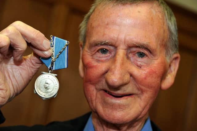 Derrick Tilley of Mansfield with his naval medal from the Kremlin after its presentation on Tuesday.