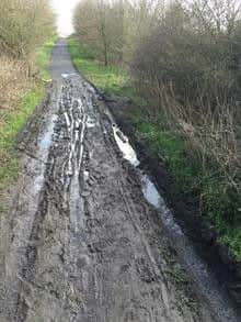A number of pieces of wood with nails and screws sticking out for it along Sporton Lane, otherwise known as Caravan Hill.