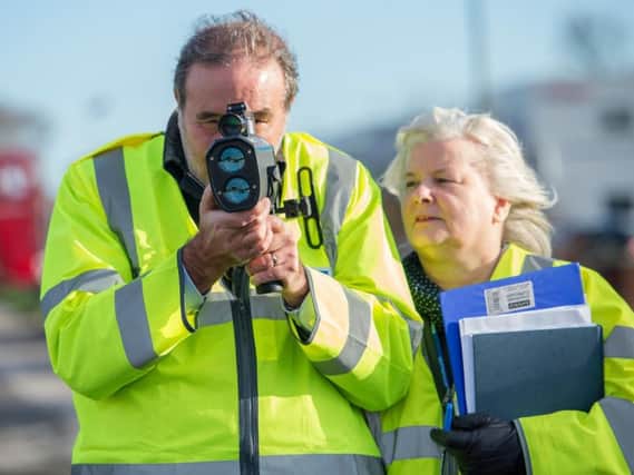 PCC candidate Paddy Tipping, photographed while joining a community speedwatch group.