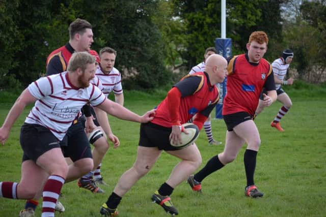 RALLYING HIS TROOPS -- Matt Upton sets another Ashfield attack in motion during the county cup semi-final defeat against Nottingham Casuals