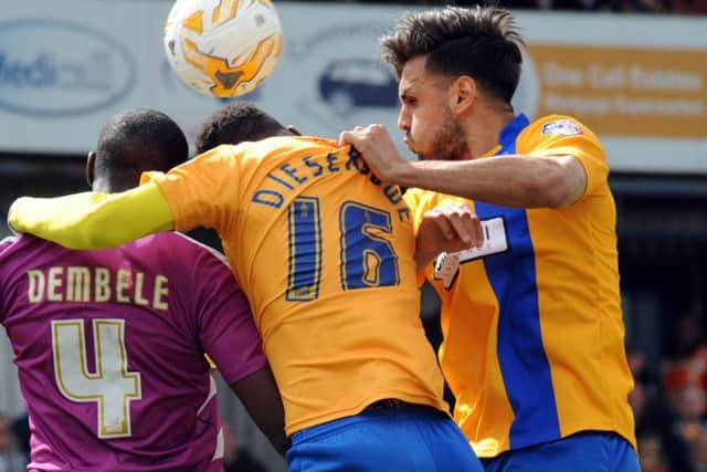 Mansfield Town v Barnet. Dieseruvwe and Tafazolli in first half action.