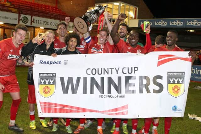 All smiles for Alfreton as they lift the Derbyshire FA Senior Cup  - Pic by: Richard Parkes