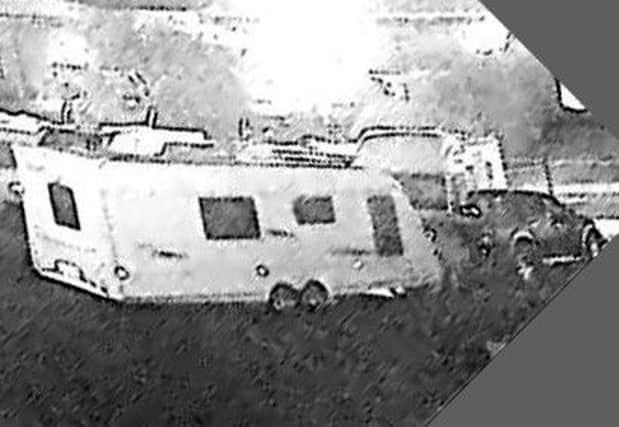 Police have released CCTV images after thieves broke into a storage yard and stole a caravan in Derbyshire. It could have driven into Nottinghamshire