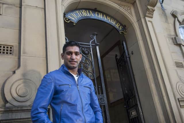Picture by Allan McKenzie/YWNG - 29/01/15 - Press - Amir Khan Penny Appeal - Wakefield, England - Amir Khan at the Victoria Chambers where the Penny Appeal is based.