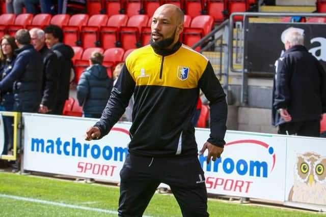Karl Hawley working on the Mansfield Town bench  - Picture Chris Holloway