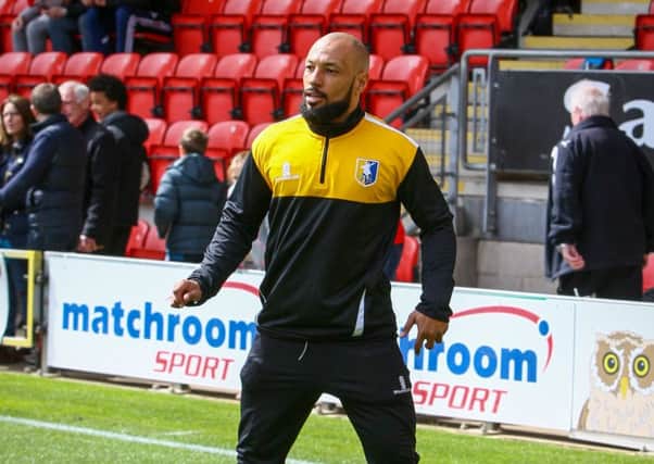 Karl Hawley working on the Mansfield Town bench  - Picture Chris Holloway