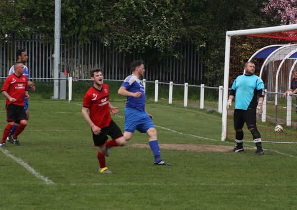 GOAL! -- Ollerton score one of their goals in the 3-0 win over Thorne Colliery. (PHOTO BY: DC Photography).