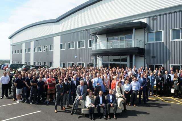 Parker Knoll staff and special guests celebrate the opening of their new state-of-the-art facility on Castlewood Business Park which was officially opened by Stephen McPartland, MP and Chairman of the All Party Parliamentary Furniture Group, Liveryman of the Furniture Makers' Company and the Chairman of Board Directors of the Furniture Ombudsman.