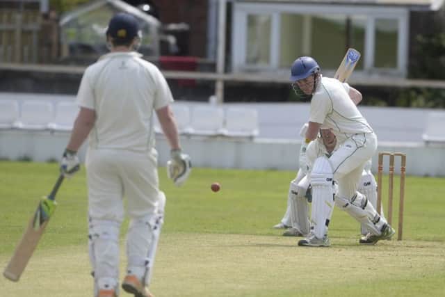 TAYLOR-MADE DEFIANCE -- batsman Harry Taylor tries to salvage Worksops innings in their heavy defeat against Farnsfield in The Championship.