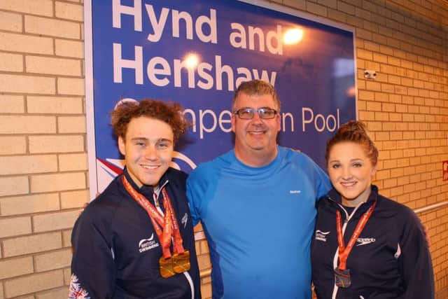 Glenn Smith, centre, with Ollie Hynd MBE and Charlotte Henshaw.
