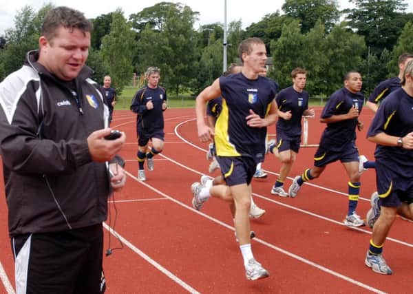 Paul Holland (left) with the Mansfield Town squad back in his days with the Stags.