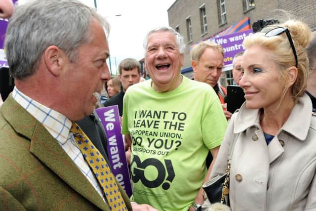 Nigel Farage on the battle bus stop off at Bulwell. A reporter from German TV ARD gets a quick chat with Nigel Farage in Bulwell.