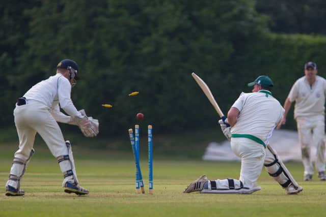 BOWLED HIM! -- Clipstone all-rounder Jason Gorman loses his middle stump, bowled by Papplewick and Linby hero Charlie Blatherwick.