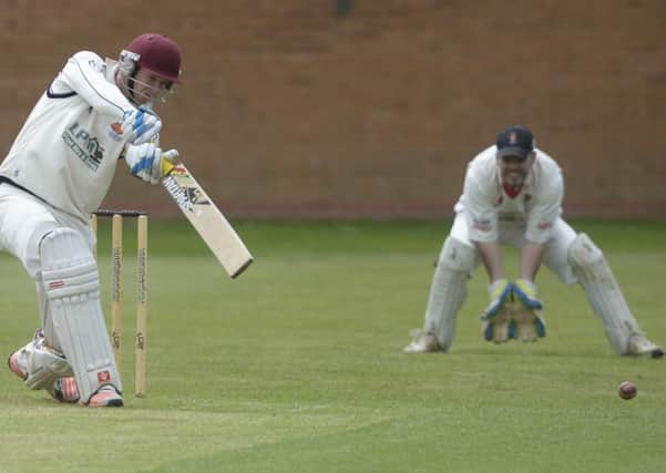 SWEET DRIVE -- by Cuckney batsman James Hawley, under the watchful eye of Welbeck wicketkeeper David Hunt, during their keenly contested derby.