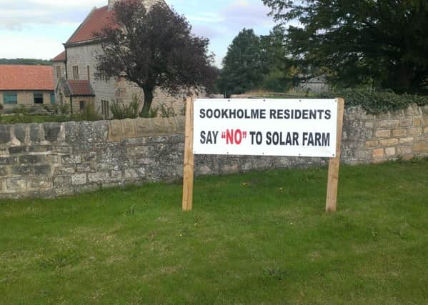 A sign objecting to the plans for a solar farm in Sookholme.