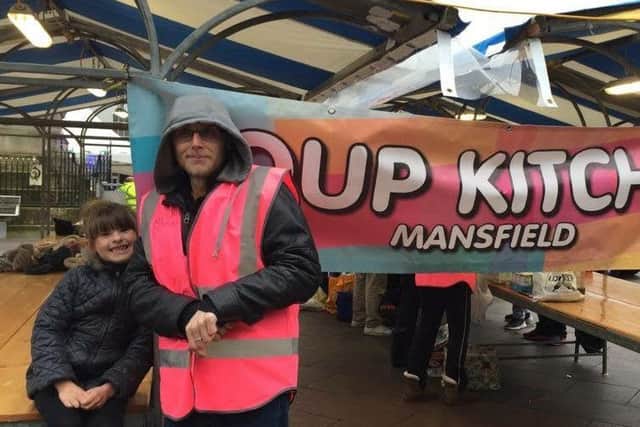 Lilli Mai Lewis, 7 of Mansfield  raised over Â£200 for the homeless after drinking water instead of pop for a week. She is pictured at Mansfield Soup kitchen.