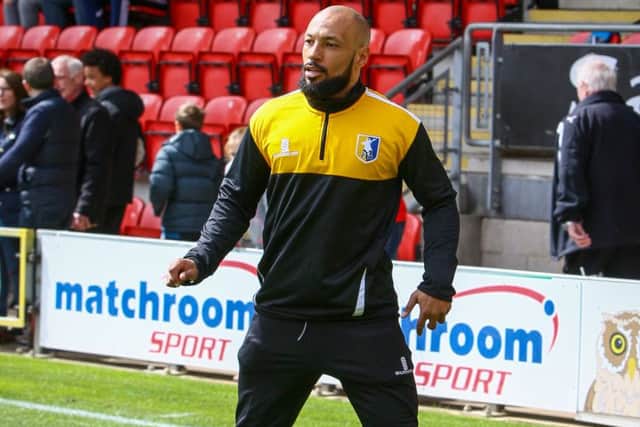 Karl Hawley working on the Mansfield Town bench - Picture Chris Holloway