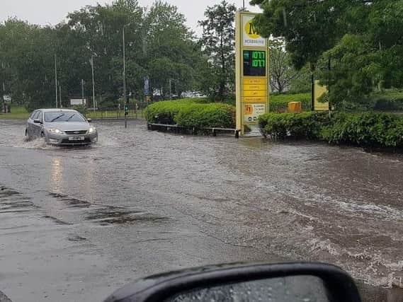 Rain floods a Mansfield road at the weekend - captured at the weekend by Richard Mccready
