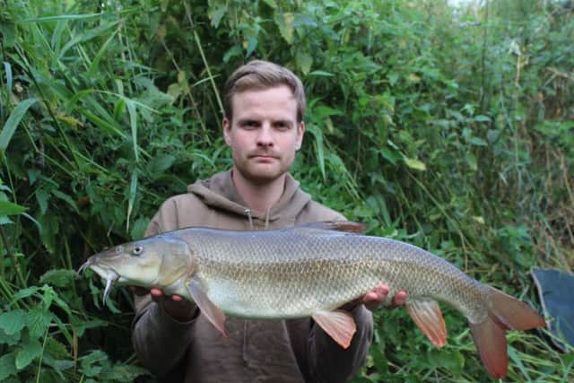 BARBELLOUS! -- talented angler Dan Ellis with a stunning-looking barbel that weighed in at 10lb 4 oz.