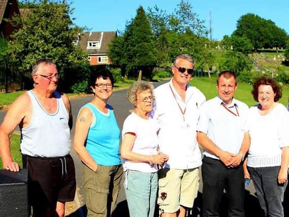 Councillor Lee Anderson, ictured with Ashfield DC chair Glynis Maxwell and Huthwaite residents.