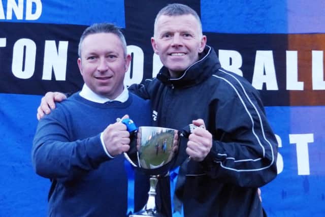 Craig Weston (right), pictured with chairman Mark Wilson after the title win, will be keen to emulate the success of last season, particularly if promotion is on the cards this time around.