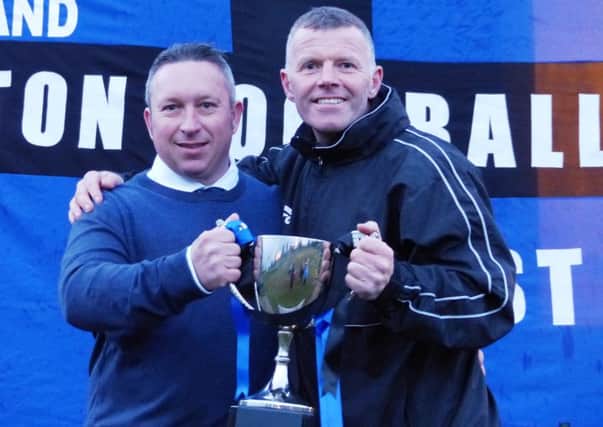 Craig Weston (right), pictured with chairman Mark Wilson after the title win, will be keen to emulate the success of last season, particularly if promotion is on the cards this time around.