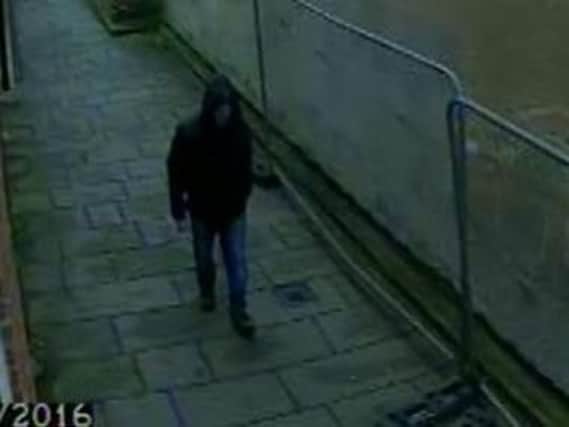 Have you seen this man. Police want to speak to him in connection to a woman robbed at knife point.