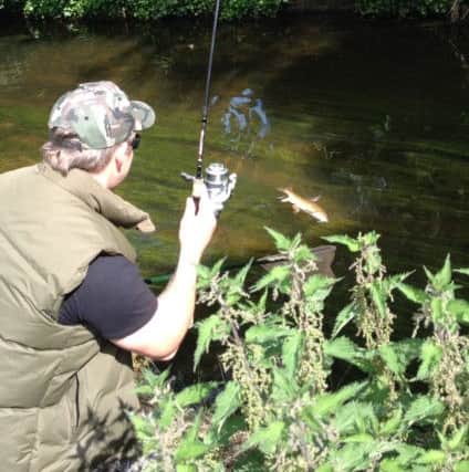 Nathan Mallatratt stalking barbel from the River Idle.