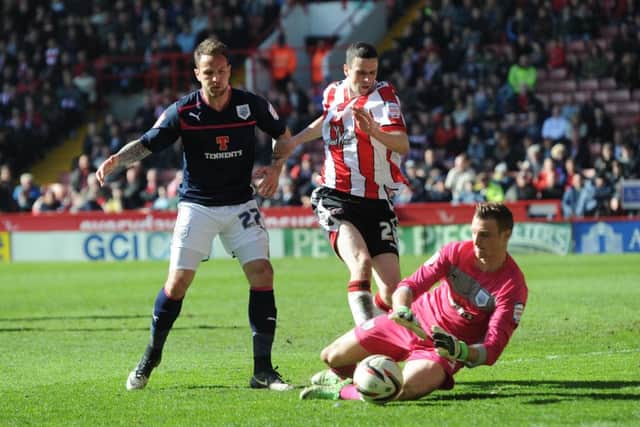 SHEFFIELD UNITED V PRESTON NORTH END   27.4.13Pic : Martyn HarrisonJamie Murphy -  Sheffield United  & Luke Foster & Declan Rudd - PrestonÂ© BLADES SPORTS PHOTOGRAPHY