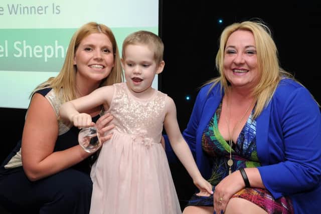 Rachel Shepherd with Ella are presented with the winnres award for Best Teaching Assistant by Jo Warburton at the Chad Best in Schools 2016 awards. Picture: Andrew Roe