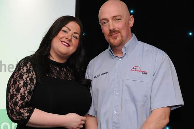Andy Gray is presented with the special recognition award for Best Secondary Teacher by Hayley Mason at the Chad Best in Schools 2016 awards. Picture: Andrew Roe