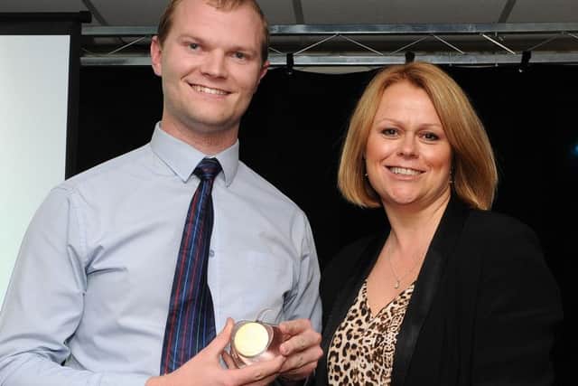 Simon Fletcher is presented with the winners award for Best Primary Teacher by Imogen Hoyle at the Chad Best in Schools 2016 awards. Picture: Andrew Roe