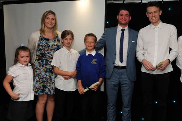St Edmund's Primary School and Garibaldi College Year 13 Sports Leaders are presented with the special recognition award for The Sports Award by Mark Stevenson at the Chad Best in Schools 2016 awards. Picture: Andrew Roe