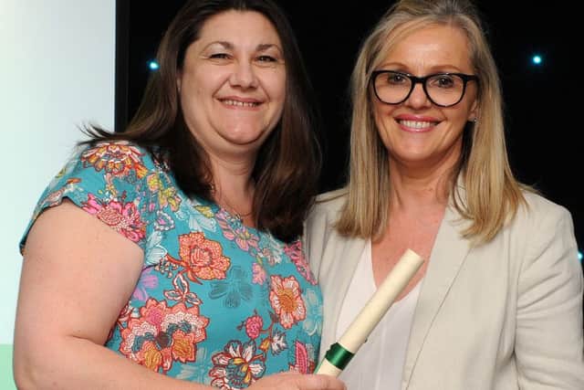 Beverly Ward is presented with the special recognition award for The Technology Award by Berni Dickinson at the Chad Best in Schools 2016 awards. Picture: Andrew Roe