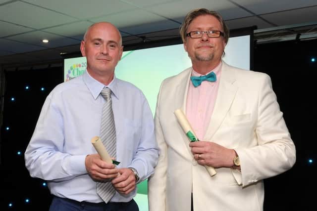 Chris Ambrick and David Annis are presented with the special recognition award for Best Caretaker by Andy Done-Johnson at the Chad Best in Schools 2016 awards. Picture: Andrew Roe