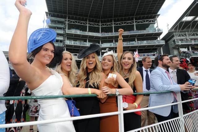 LADIES DAY AT YORK -- the Ebor Festival at York in August is one of a succession of excellent summer meetings across the UK.
